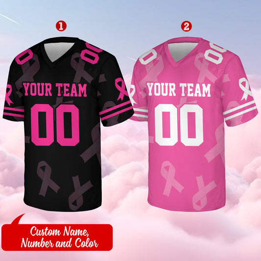 White and pink jersey with bold block letters on the front, pink ribbon emblem on the chest, short sleeves, sporty V-neck design, customizable name and number on the back